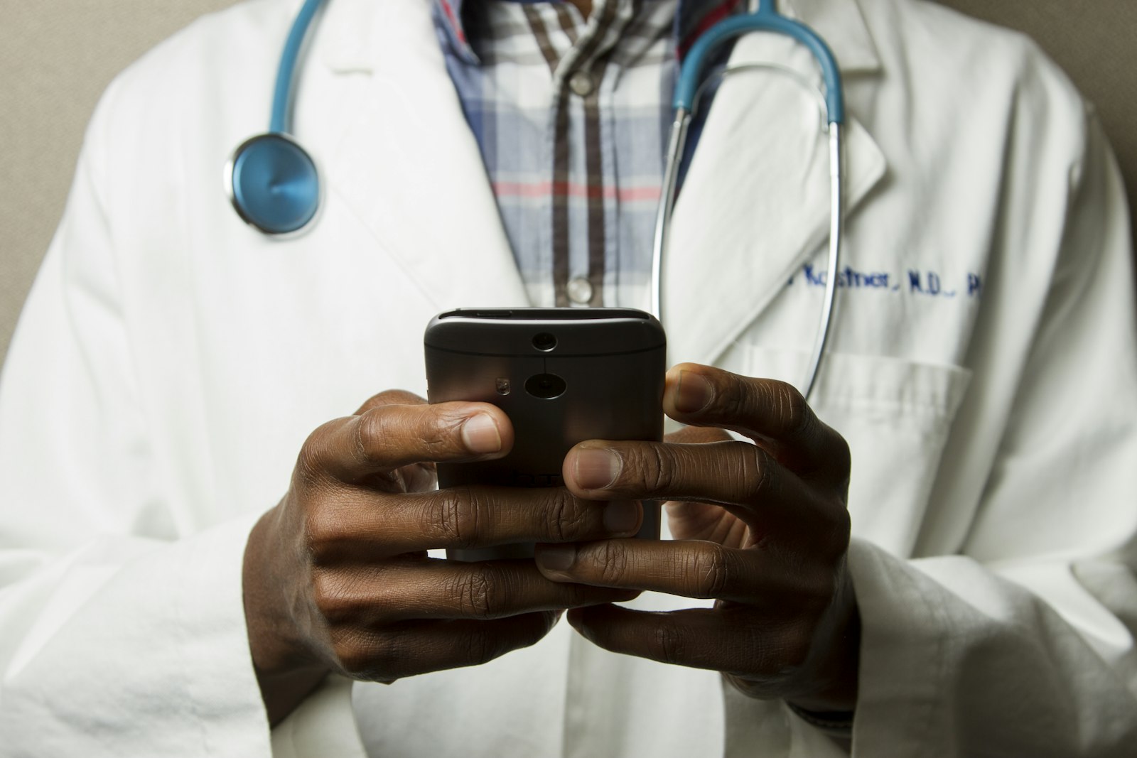 Doctor consulting with a patient about referral options